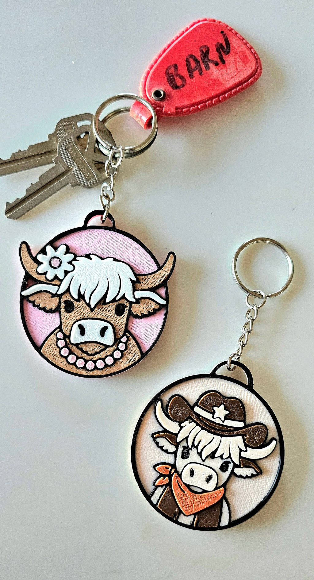 3D PRINTED COWGIRL HIGHLAND COW KEYCHAIN