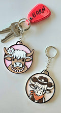 3D PRINTED COWGIRL HIGHLAND COW KEYCHAIN