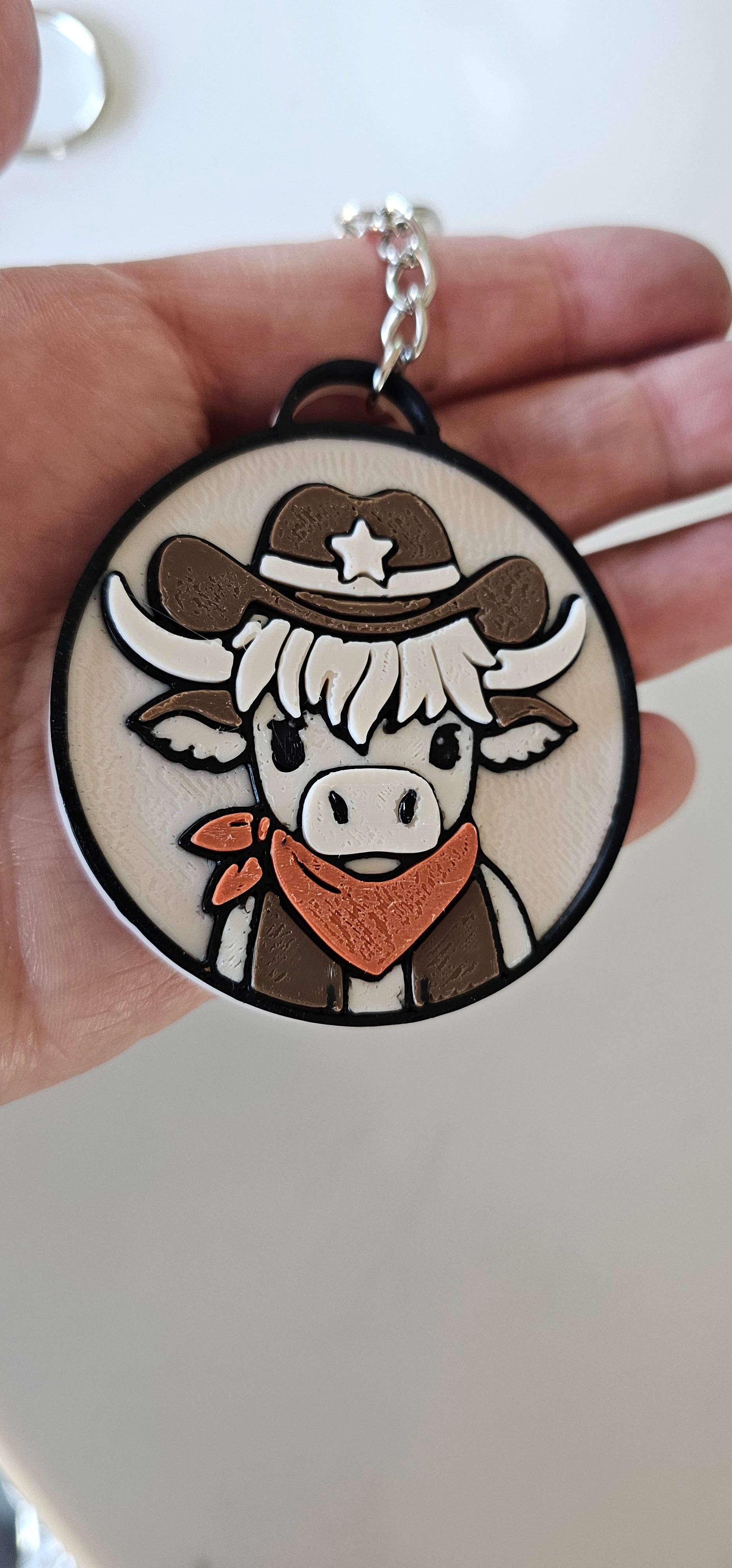 3D PRINTED COWGIRL HIGHLAND COW KEYCHAIN