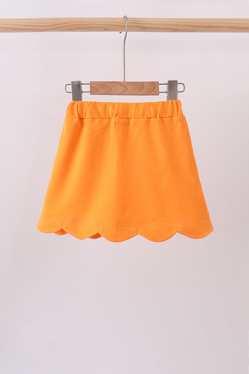 Orange scallop hem bow skort