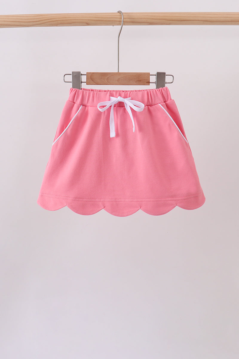 Deep pink scallop hem bow skort