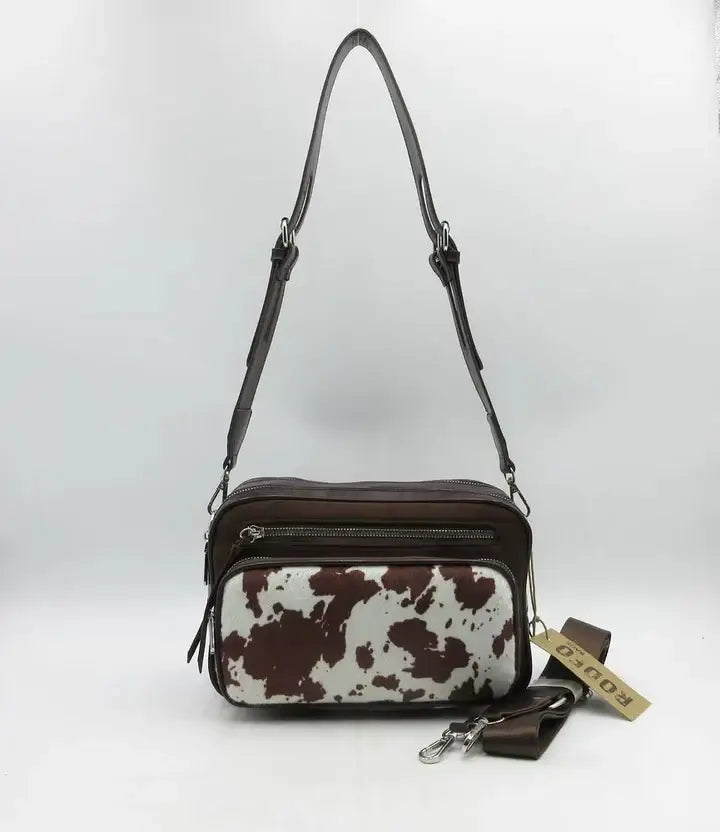 RODEO BROWN COW PRINT CROSS BODY HANDBAG