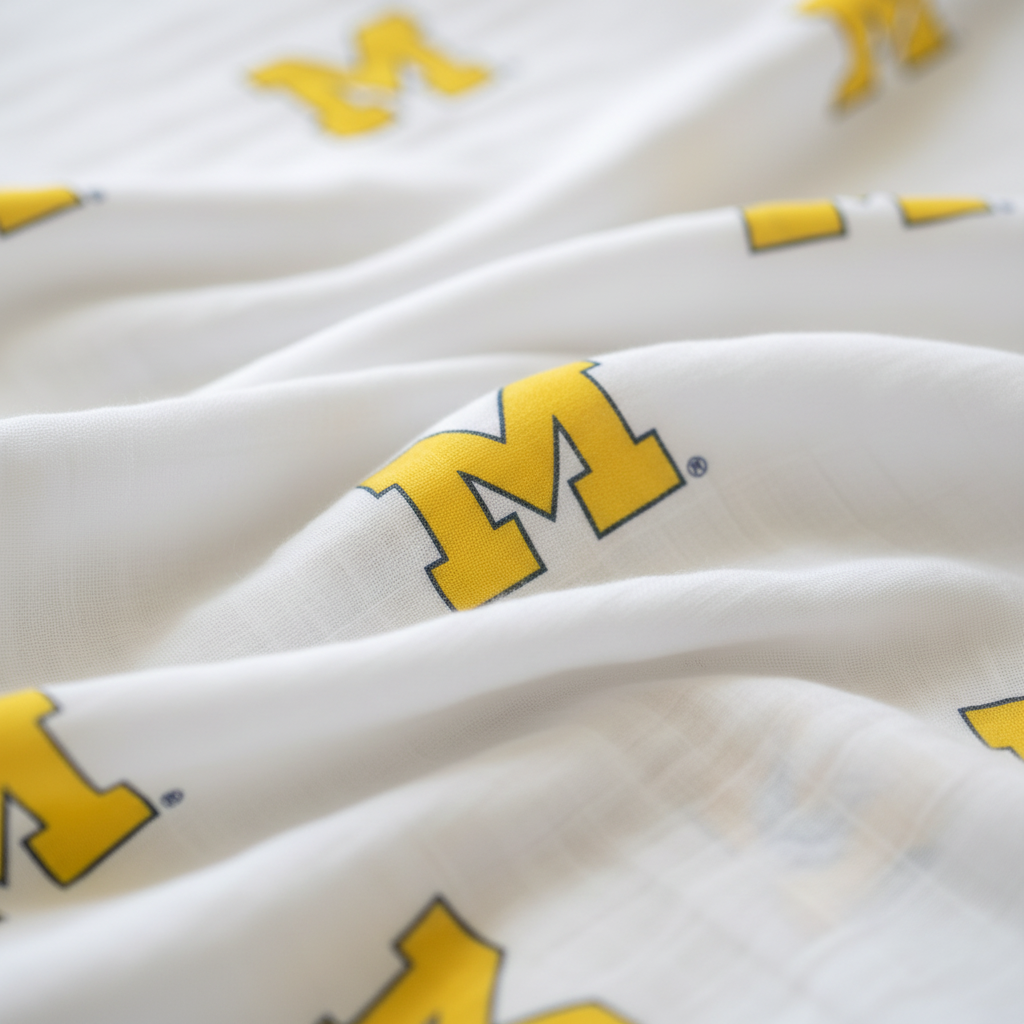 University of Michigan Wolverines Muslin Swaddle Blanket – Premium 100% Cotton 47x47 – Officially Licensed U of M Baby Gift