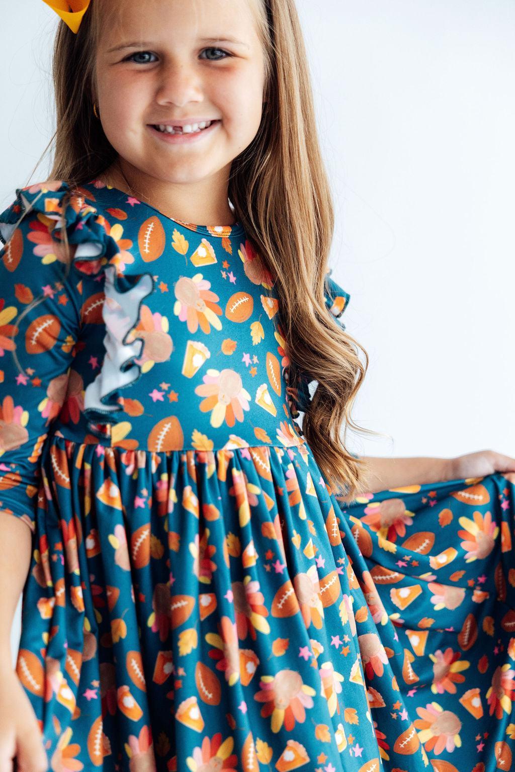 Gobble til You Wobble 3/4 Sleeve Ruffle Twirl Dress